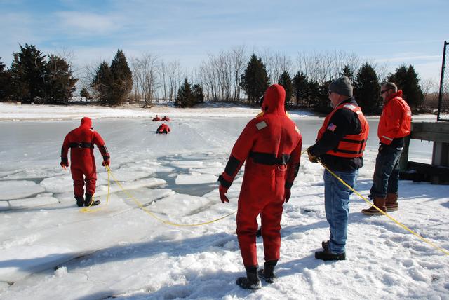 Shore personnel waiting to assist.