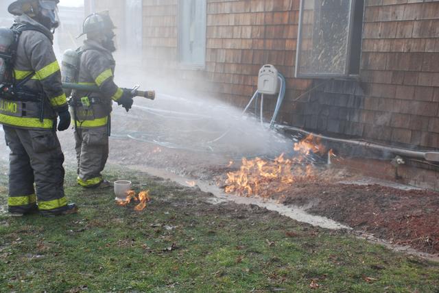 Upon arrival natural gas pushing up through the soil was burning on the surface.  Gas was coming from a Keyspan supply line that had ruptured outside the foundation, but allowed gas to enter the basement where it attained its LEL and found a source of ignition.  