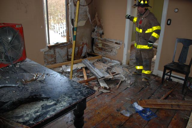 Brian assessing interior damage.
