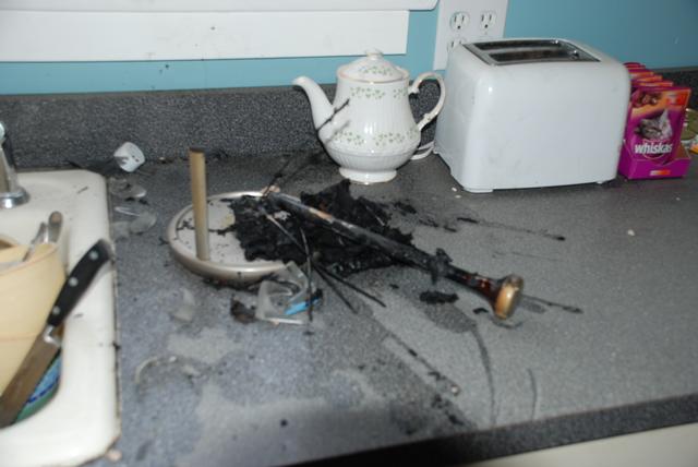Items on kitchen counter melted by heat of explosion.
