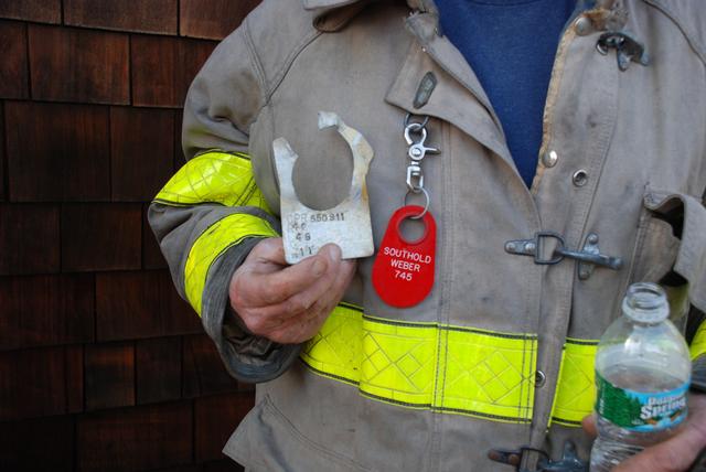 Chief Weber displaying the Keyspan location tag.