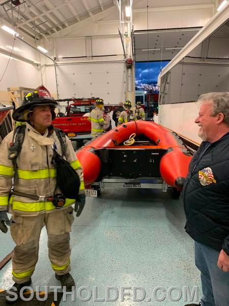 Chris Manfredi discussing technique with 
member and NYFD veteran Brian Smith.